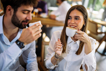 Couple drinking coffee in cafe
