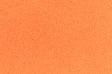 Fototapeta premium Coral orange texture of new and recycled paper with natural clean surface