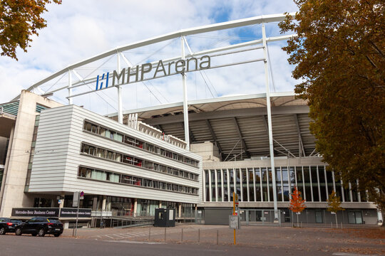 Exterior view of the MHP Arena (VfB Stuttgart football stadium) and the adjacent Mercedes-Benz Business Center in Stuttgart, Germany, on a partly cloudy autumn day