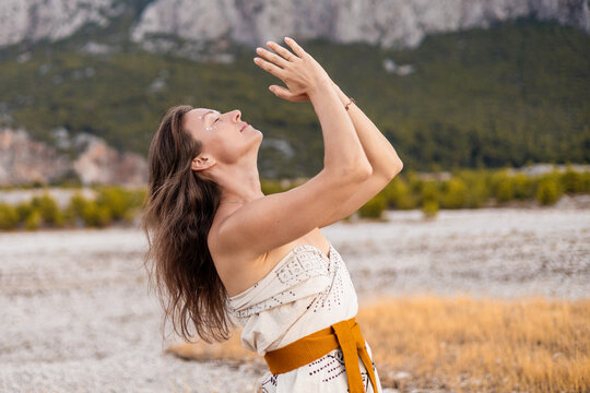 Hippie woman embracing tranquility in the outdoors