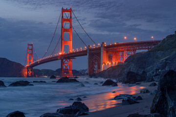 Golden Gate Bridge at twilight from the rocky shore
