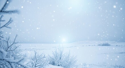 Snowy landscape with snowflakes falling, trees, and a bright light source in the distance.