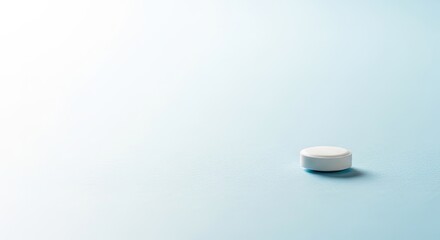 A white pill on a blue background.