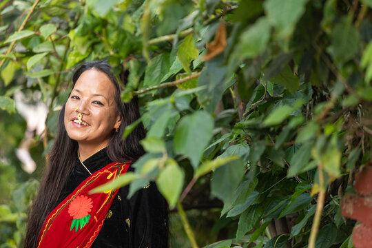 Nepali woman in traditional dress with a bright smile