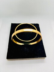 Gold bracelets isolated with white background