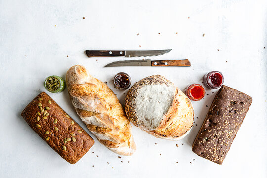 Top view of sourdough bread assortment with spreads
