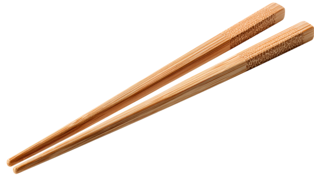 Pair of wooden chopsticks on a black background