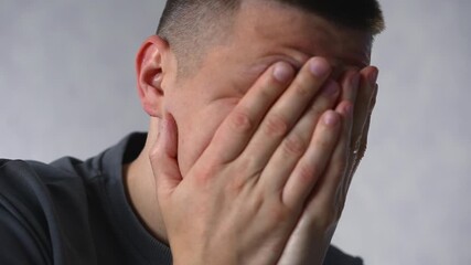 A man is experiencing depression and mental illness.
A man with life problems.
Sadness and a bad mood.
A guy's life problems