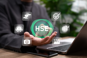 Health Safety Environment HSE Management Concept, Businessman showing HSE icons on hand, representing safety management, Industrial standards, Environmental responsibility,Sustainable risk in business