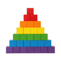 Colorful building blocks stacked in a rainbow pyramid formation for creative play and education