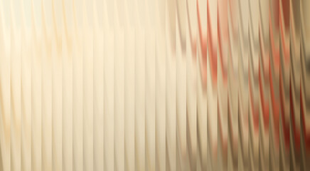 Abstract, blurred image, featuring a golden, reflective surface with soft textures and subtle color variations