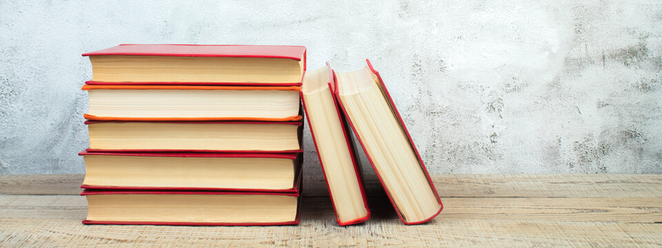 open book, books on the gray concrete background. Back to school. Education. Copy space for text. Banner. - Powered by Adobe