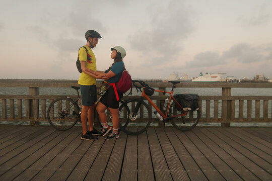 Couple embarking on bicycle journey in northern France