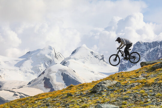 Mountain biking adventure in Zermatt's alpine landscape