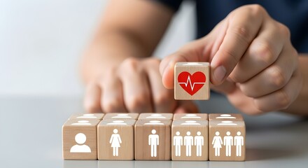 Hand holding wooden cube with heart beat icon, concept of health and wellness isolated on white background