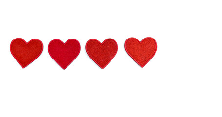 Red blank textile hearts on a white background