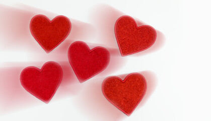 Red blank textile hearts on a white background
