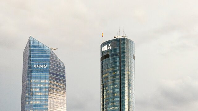 Madrid, Spain - October 16, 2025:  View of KPMG and OHLA skyscrapers at Cuatro Torres Business Area in Madrid, Spain, at sunset