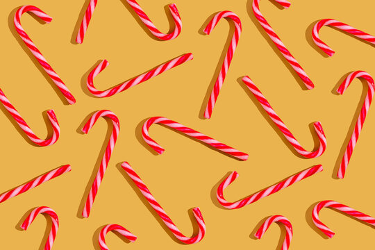 Candy canes on a festive yellow background