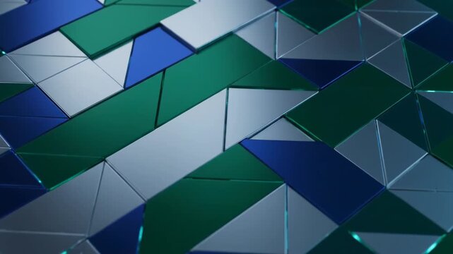Abstract triangular pattern with blue green and silver colors on a dark background for graphic design