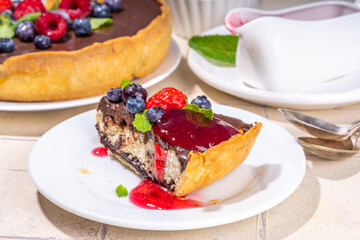 Homemade cheesecake with chocolate and berry