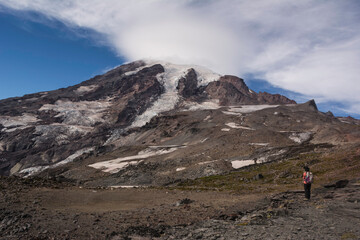 Woman looking at Mount Rainier from McClure Rock