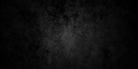 Distressed rough black cracked wall slate texture wall grunge backdrop smoke background. Stone concrete texture anthracite panorama. Old vintage charcoal night dark black stucco design.	