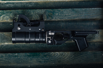 precise photograph highlighting attachment mechanisms and tactical integration details of weapon