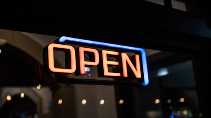 "OPEN" sign. Illuminated at night.