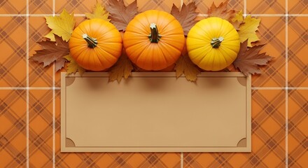 Warm autumn harvest scene featuring vibrant pumpkins and colorful fall leaves atop a cozy plaid background with a blank space for text