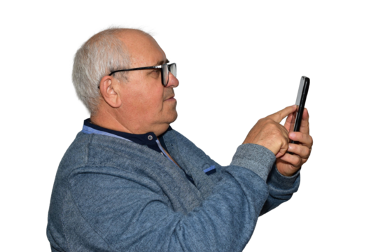 A man holds a smartphone in one hand and swipes across the screen with the finger of his other hand. Side view. - Powered by Adobe