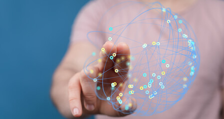 A person's finger points to a network globe, representing global connectivity, technology, and innovation. Perfect for illustrating concepts of