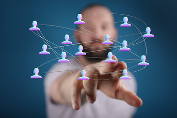 Concept of global network and teamwork. Man touching a network of people. Teamwork and business network concept.