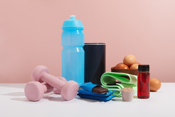 Fitness essentials with protein and workout gear