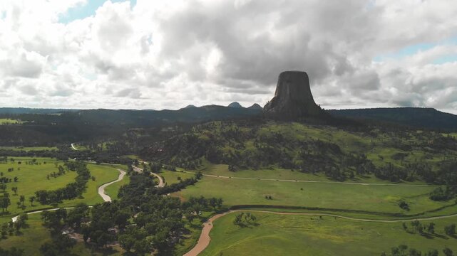 Devil's Tower National Monument and surrounding landscape in summer season. Beautiful aerial view on a sunny afternoon