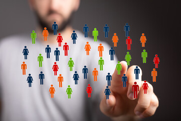 Concept of social connections, networking, and digital communication, featuring a diverse group of colorful people icons representing teamwork a