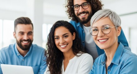 Group of young professionals collaborating in a bright modern office setting during a creative brainstorming session