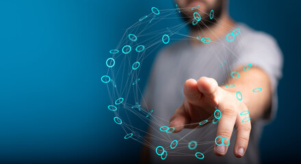 Close-up of a man's hand interacting with a digital network sphere, emphasizing connection, innovation, and futuristic technology. Perfect for t