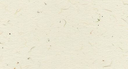 Close up of textured handmade paper with visible fibers and specks