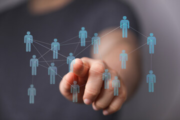 Abstract network of interconnected human figures with a finger pointing. Representing connection, communication, and digital relationships. Busi