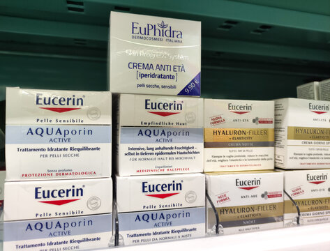 Gualdo Tadino, Italy - October 27, 2025: Eucerin and EuPhidra skincare products displayed on a pharmacy shelf, showcasing various anti-aging and hydrating creams for sensitive skin