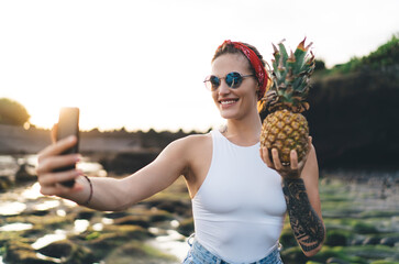 Woman smiling while taking photo