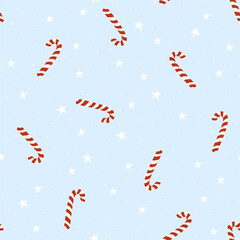 Christmas seamless pattern with candy canes over a light blue background with white stars for festive occasions. Cute minimalist retro design holiday print. Hand drawn vector illustration.