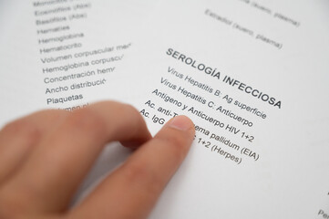 Person checking infectious diseases serology blood test results