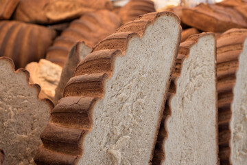 Sliced rustic stone oven bread showing its hearty texture.