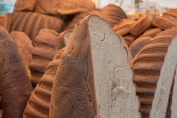 Sliced rustic stone oven bread showing its hearty texture.