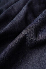 Denim Fabric Close-up Photo - Denim, Fabric, Texture. Dark Denim Fabric Texture Close-Up Waves of Denim. Background Of Textured Denim Jeans, Raw Denim Images, Pictures And Stock Photos