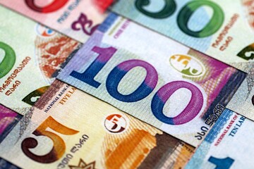 Obraz premium Georgian Lari currency money bills. GEL currency banknotes in pile with different denomination close up