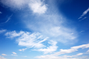 The sky is blue and clear with a few clouds scattered throughout