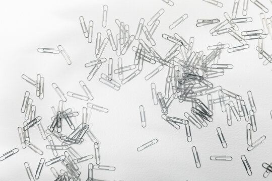 Paper clips on white surface
